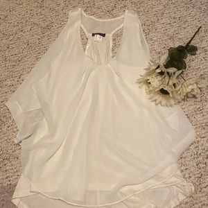 Super cute Flowy racer back blouse